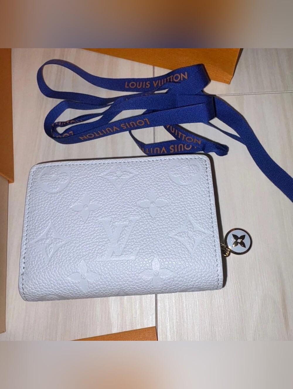 Louis Vuitton Pale Blue Leather Compact Wallet with Gold Accents - Picture 1 of 10